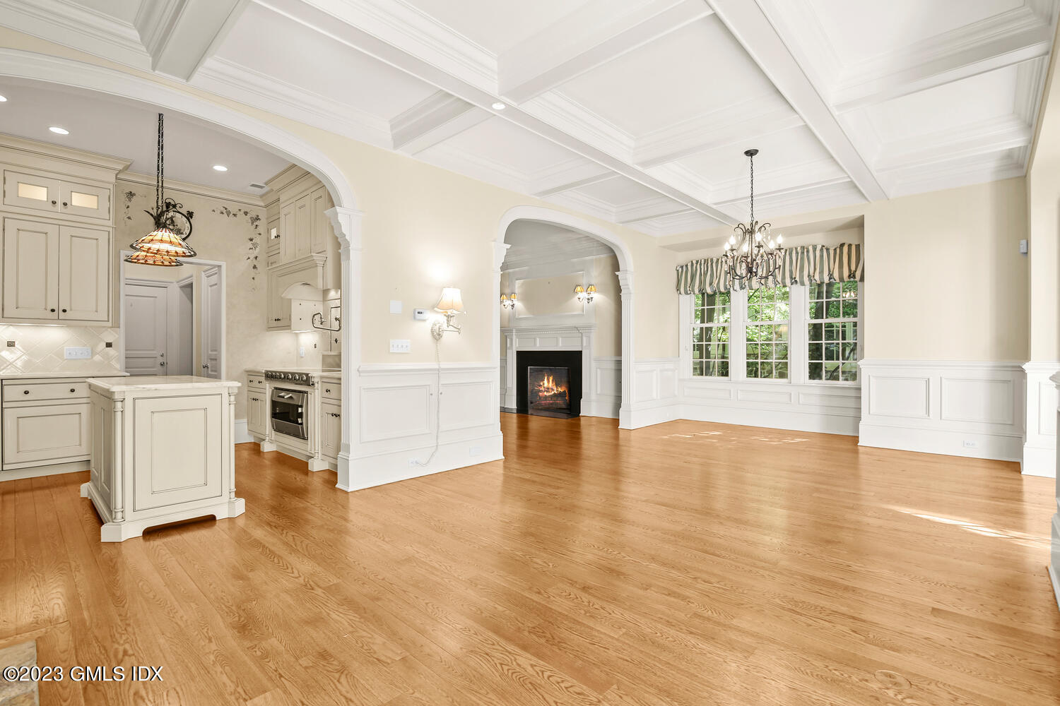 100 East Elm Street, Unit 1 Greenwich, CT 06830 - Photo 27 of 27 a view of a living room kitchen and a fireplace