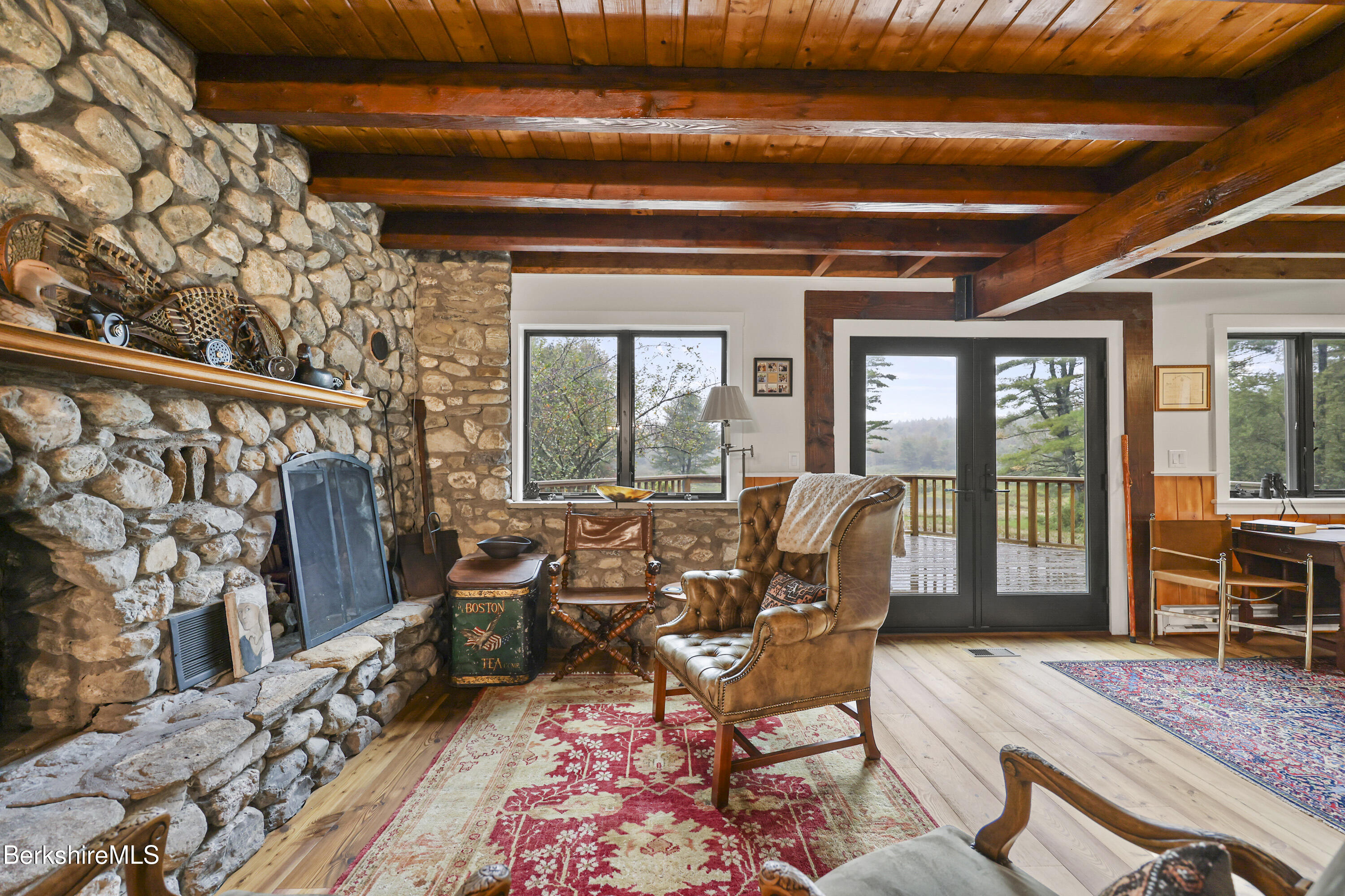 327 Chester Road Becket, MA 01223 - Photo 12 of 49 a living room with furniture and wooden floor