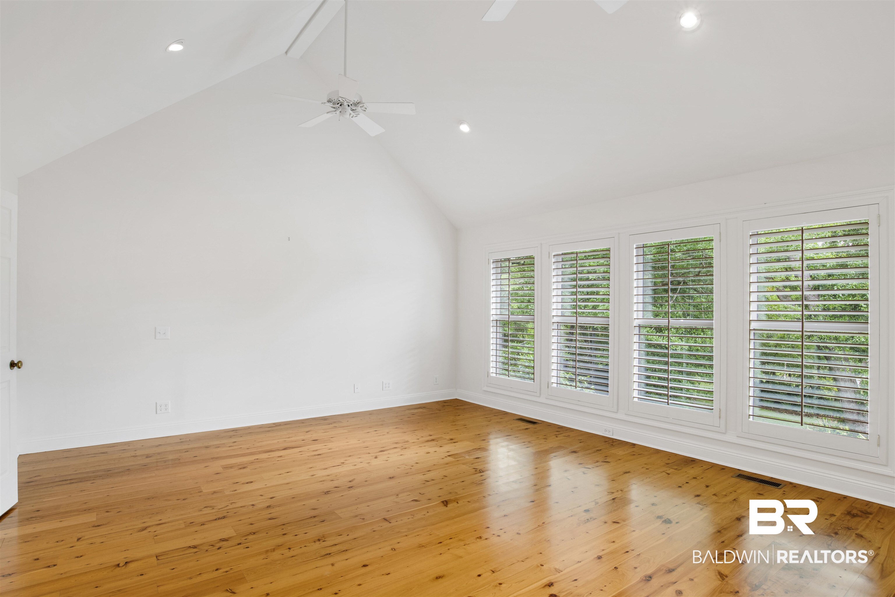 16864 Ferry Rd Circle Fairhope, AL 36532 - Photo 40 of 68 Spare room featuring ceiling fan, light wood-style floors, recessed lighting, high vaulted ceiling, and baseboards