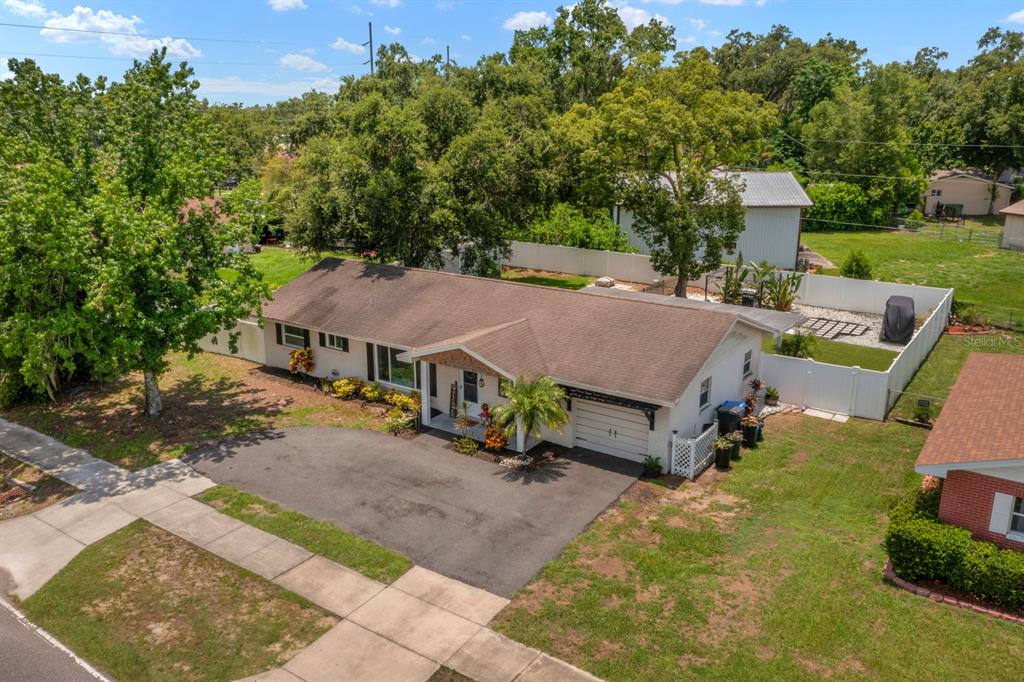 2307 South Kingsway Road Seffner, FL 33584 - Photo 1 of 1 aerial view of a house with a yard table and chairs