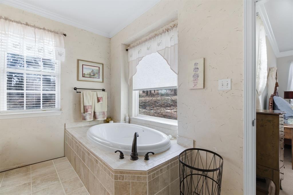 240 Johnson Bend Road Weatherford, TX 76088 - Photo 22 of 40 a living room with a couch and a large window