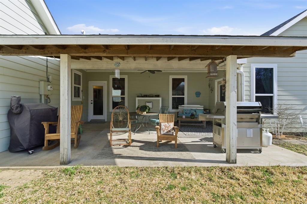 240 Johnson Bend Road Weatherford, TX 76088 - Photo 29 of 40 a view of a living room with wooden floor