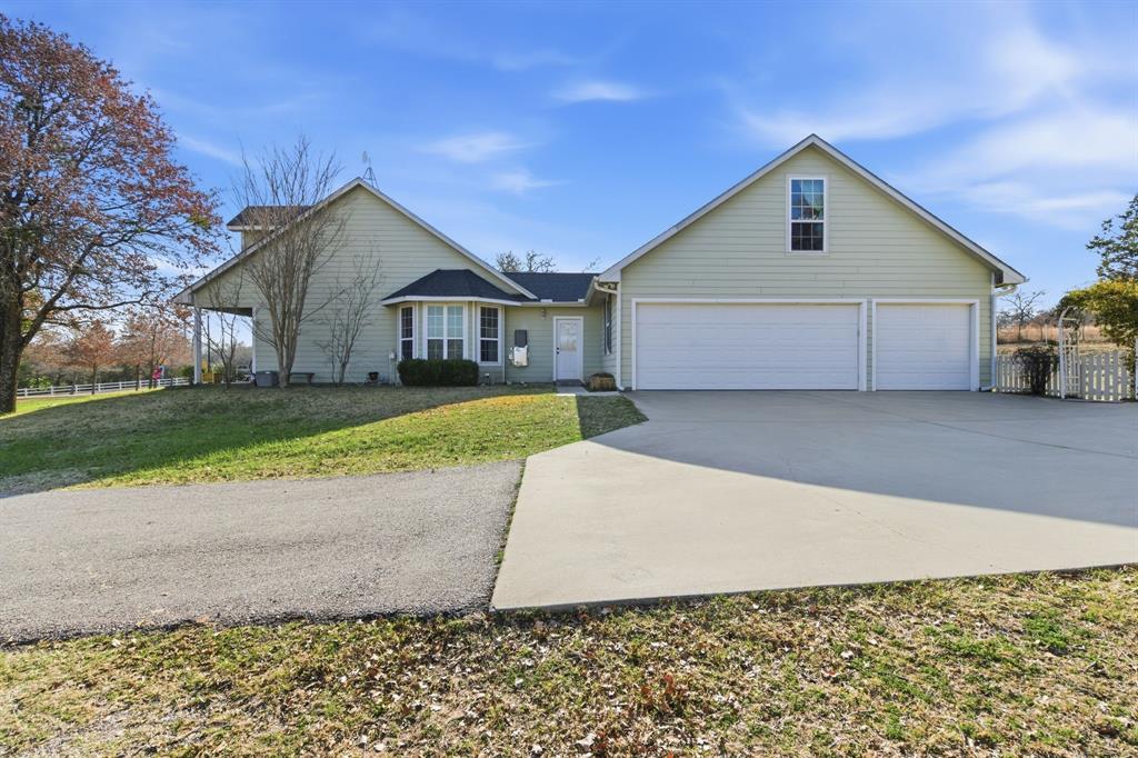 240 Johnson Bend Road Weatherford, TX 76088 - Photo 31 of 40 a view of a house with a yard