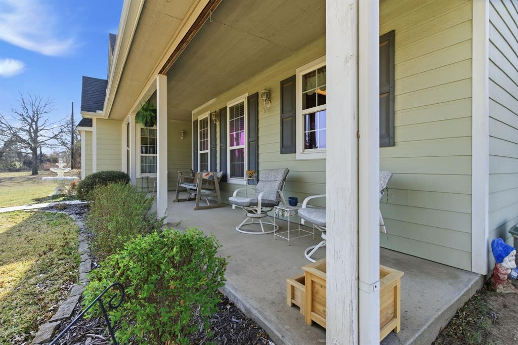 240 Johnson Bend Road Weatherford, TX 76088 - Photo 6 of 40 a view of house with patio outdoor seating area