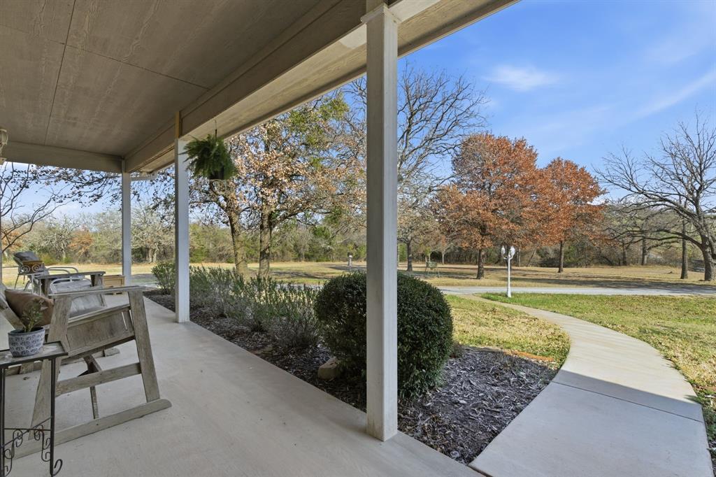 240 Johnson Bend Road Weatherford, TX 76088 - Photo 7 of 40 a view of a patio with a yard