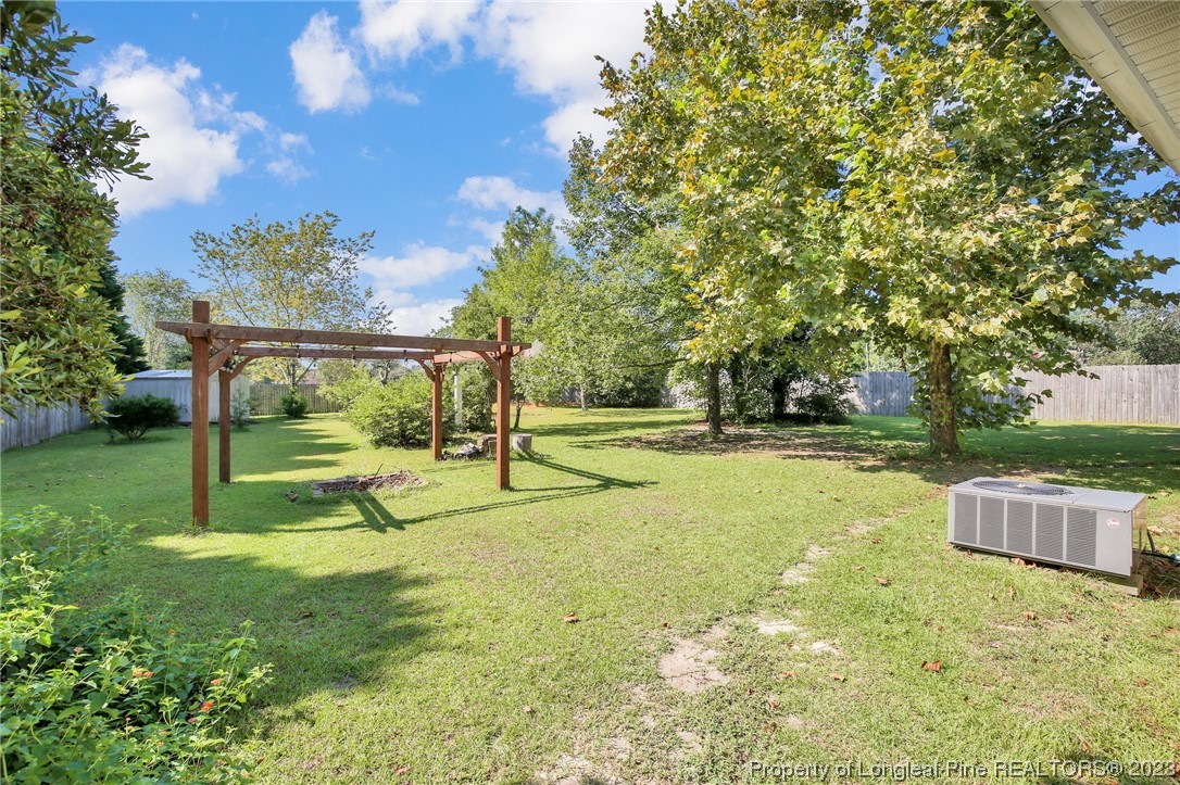 304 Kernstown Road Raeford, NC 28376 - Photo 27 of 33 a view of a yard with a tree