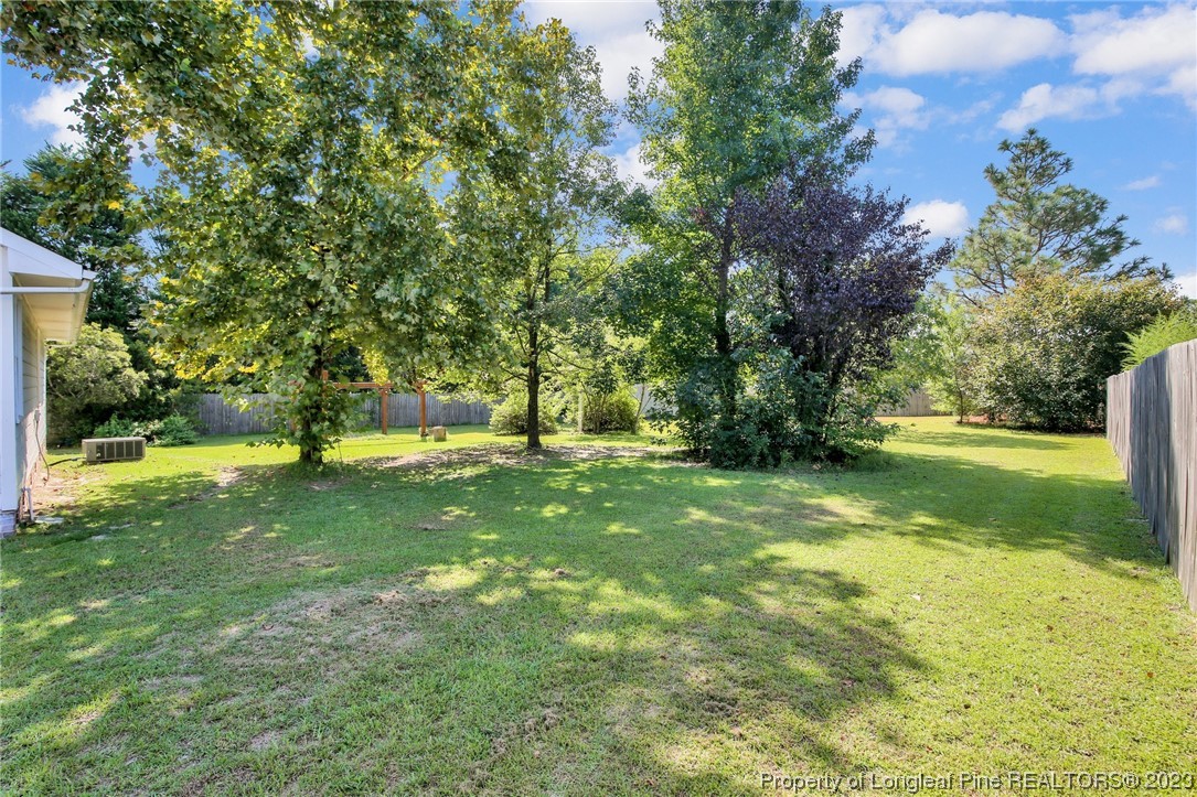 304 Kernstown Road Raeford, NC 28376 - Photo 32 of 33 a view of yard with swimming pool