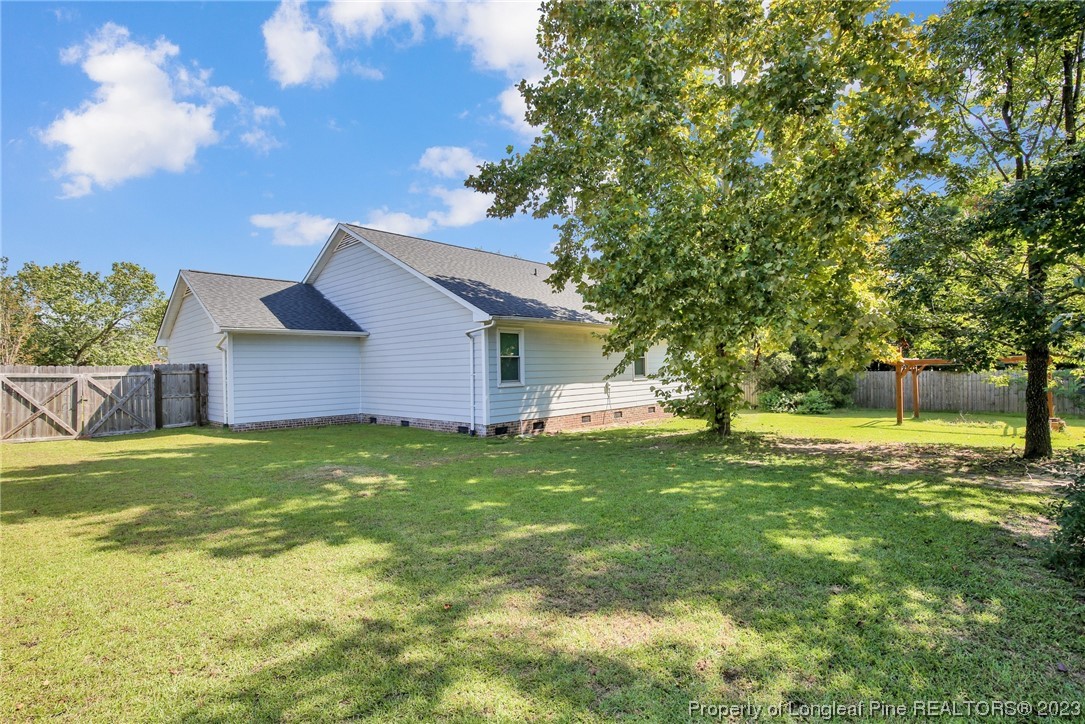 304 Kernstown Road Raeford, NC 28376 - Photo 33 of 33 a house view with a garden space