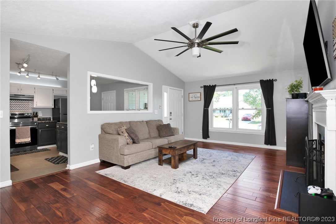 304 Kernstown Road Raeford, NC 28376 - Photo 6 of 33 a living room with furniture and a flat screen tv
