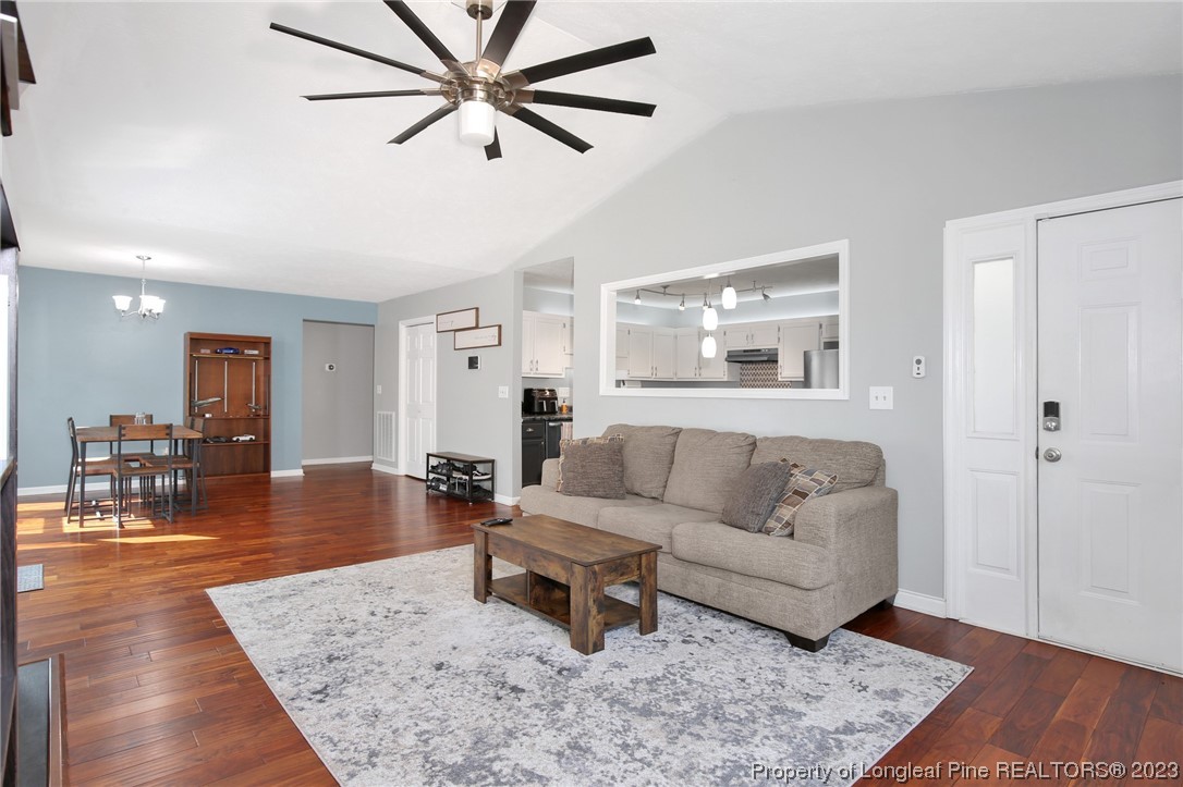 304 Kernstown Road Raeford, NC 28376 - Photo 7 of 33 a living room with furniture and a wooden floor