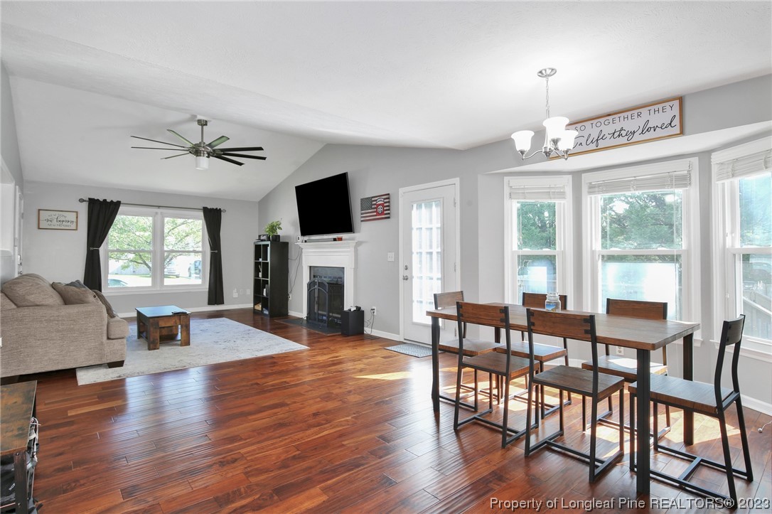 304 Kernstown Road Raeford, NC 28376 - Photo 10 of 33 a view of a livingroom with furniture window and wooden floor