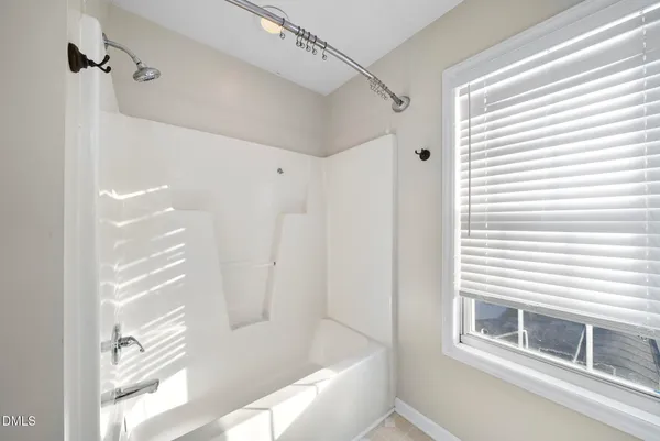 a bathroom with a sink vanity and a mirror