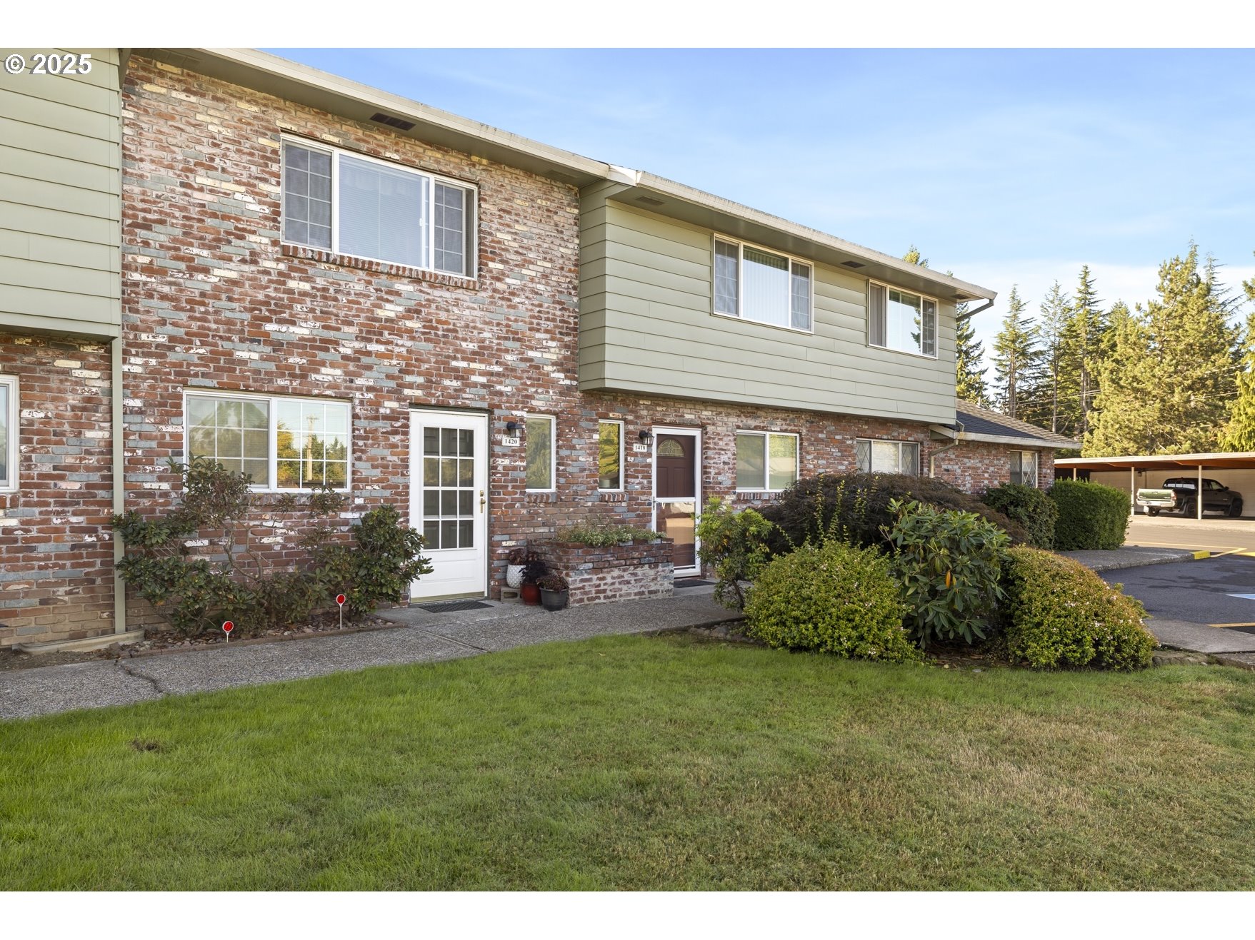 1418 Northeast Hogan Drive Gresham, OR 97030 - Photo 1 of 43 a view of a house with backyard and sitting area