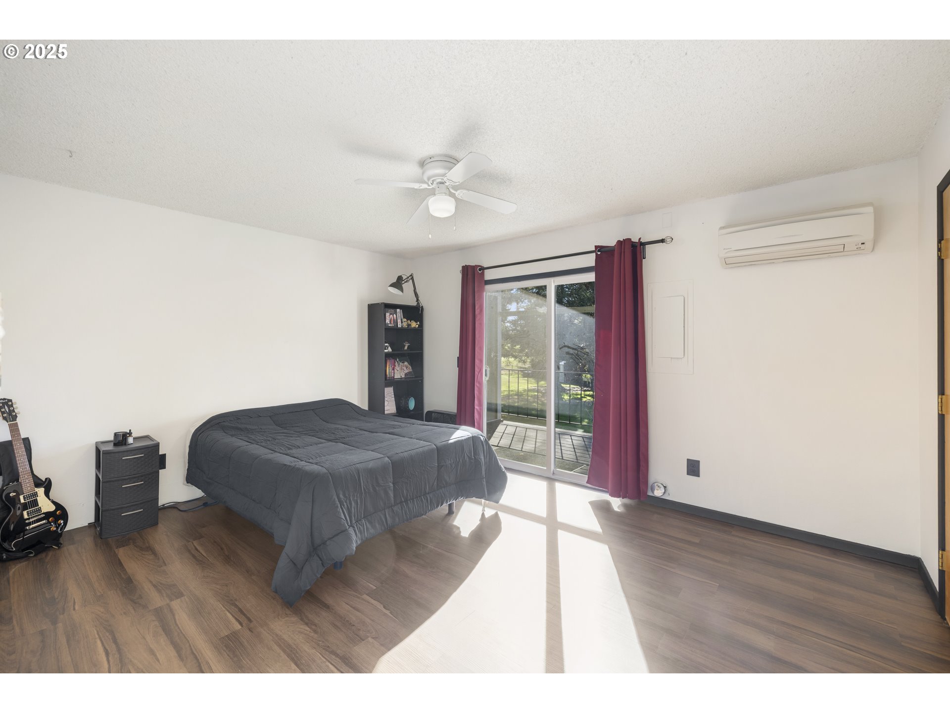 1418 Northeast Hogan Drive Gresham, OR 97030 - Photo 19 of 43 a living room with a couch and a large window