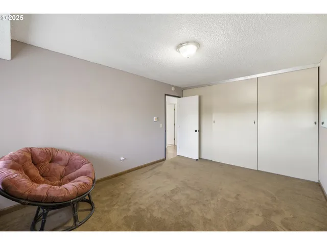a living room with furniture and window