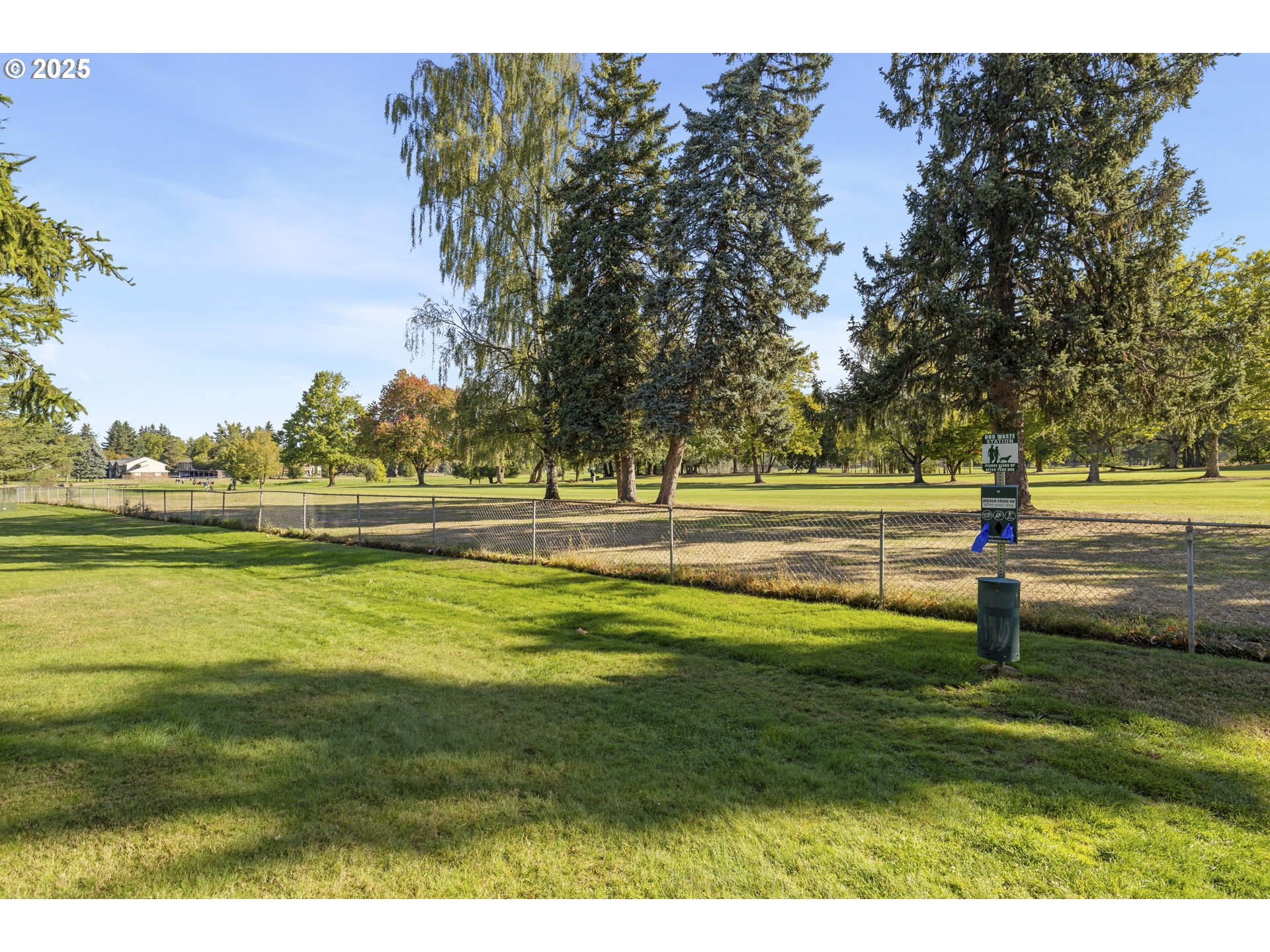 1418 Northeast Hogan Drive Gresham, OR 97030 - Photo 40 of 43 a view of a golf course with a lake