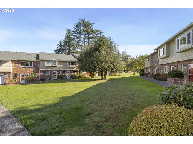 a view of outdoor space with garden and deck