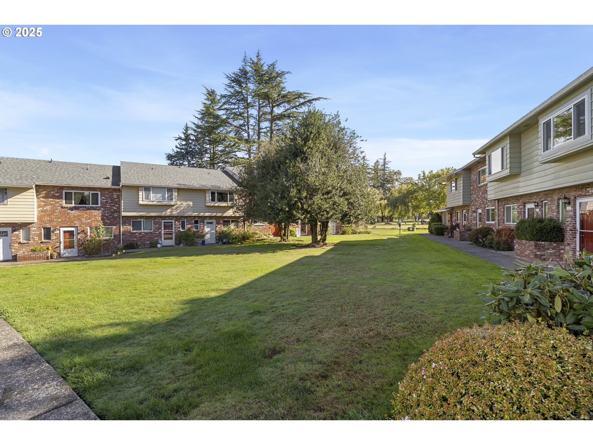 1418 Northeast Hogan Drive Gresham, OR 97030 - Photo 5 of 43 a view of outdoor space with garden and deck