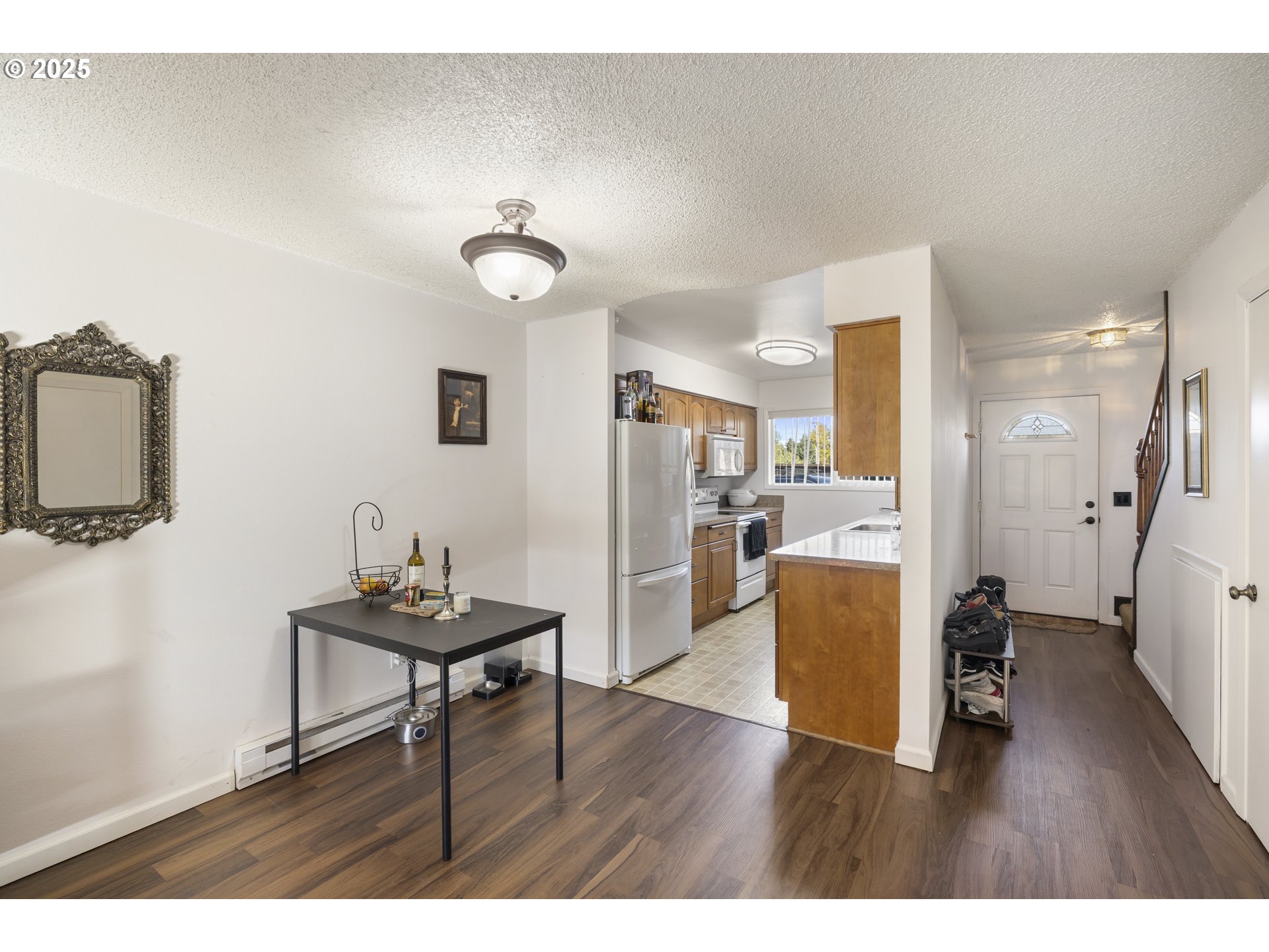 1418 Northeast Hogan Drive Gresham, OR 97030 - Photo 7 of 43 a living room with furniture and a wooden floor