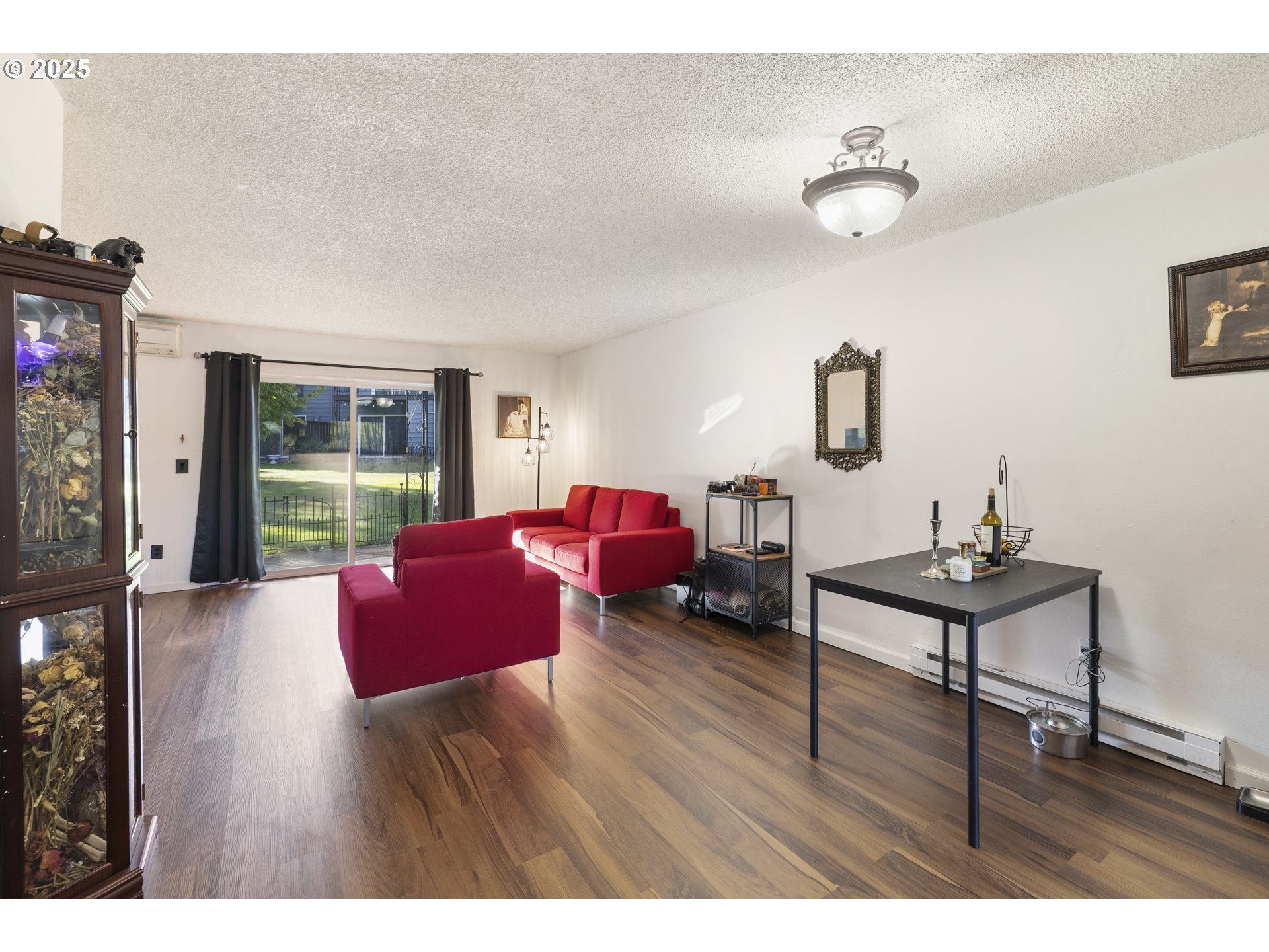 1418 Northeast Hogan Drive Gresham, OR 97030 - Photo 10 of 43 a living room with furniture and wooden floor