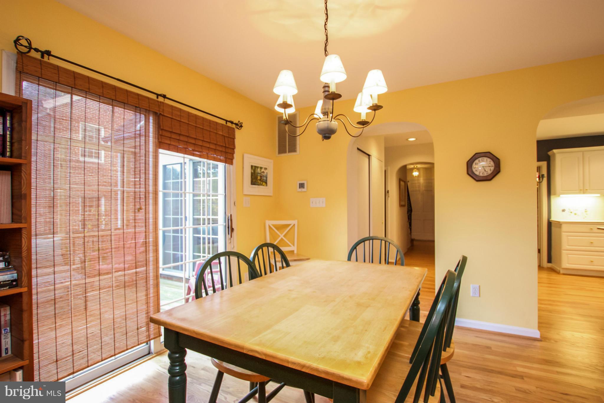 508 Yarmouth Road Baltimore, MD 21286 - Photo 4 of 28 a view of a dining room with furniture and wooden floor