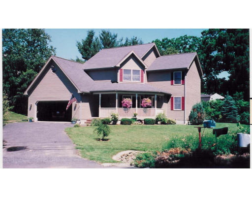 2 Spring Street Hopkinton, MA 01748 - Photo 1 of 1 a front view of a house with a yard