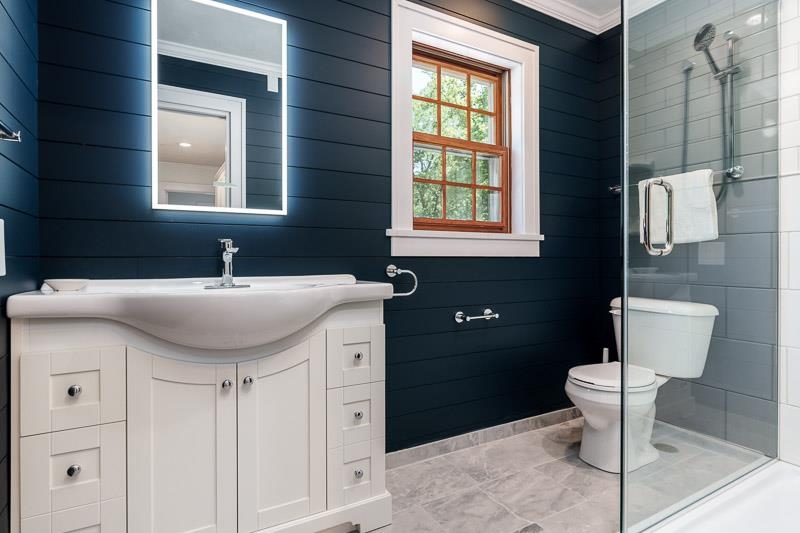 2716 Spring Creek Road Rockford, IL 61107 - Photo 46 of 76 a bathroom with a sink toilet and a mirror