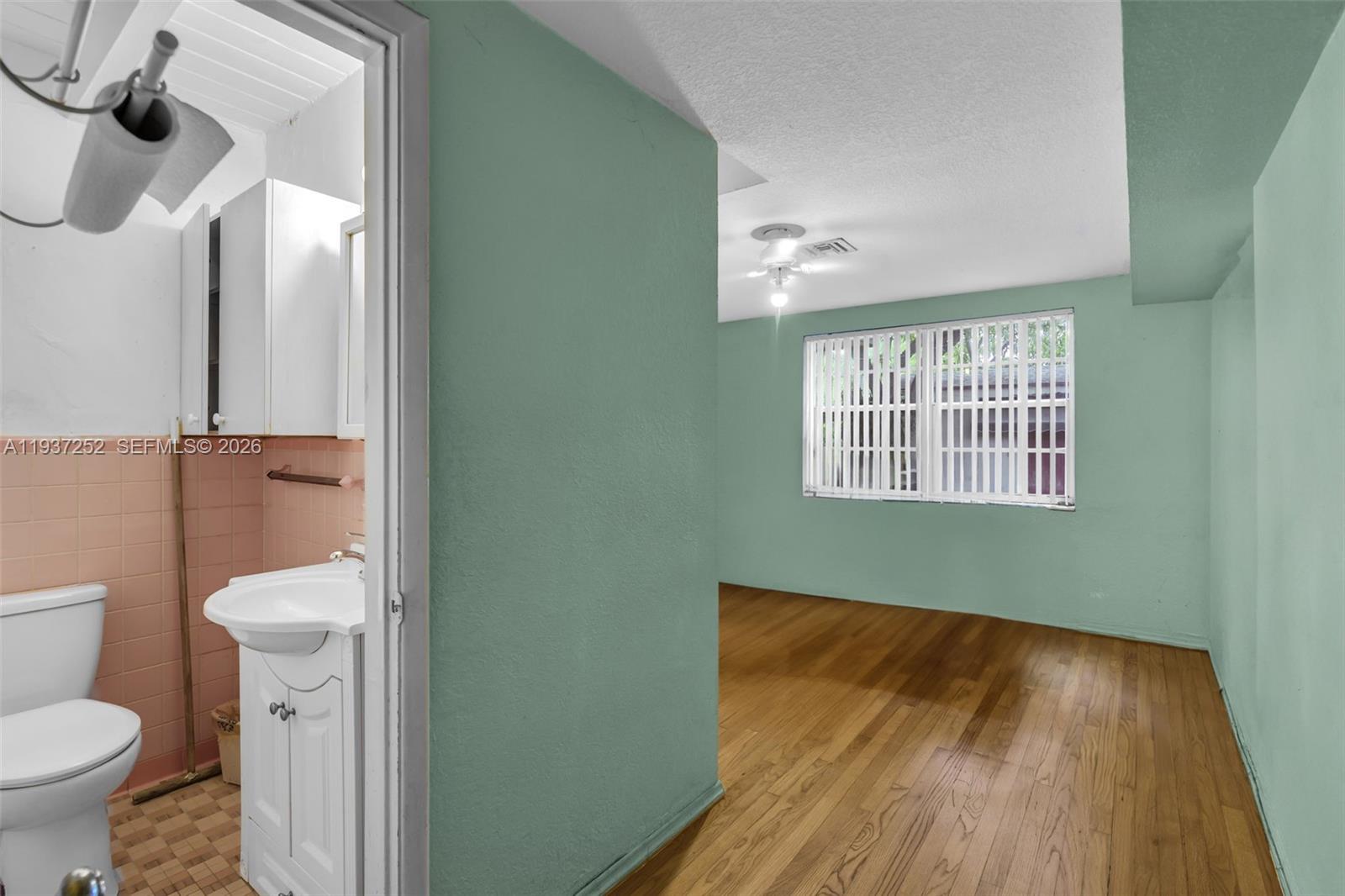 1941 Southwest 18th Street Miami, FL 33145 - Photo 18 of 31 Bedroom w/bathroom