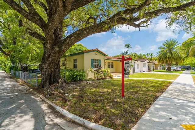 a front view of house with yard