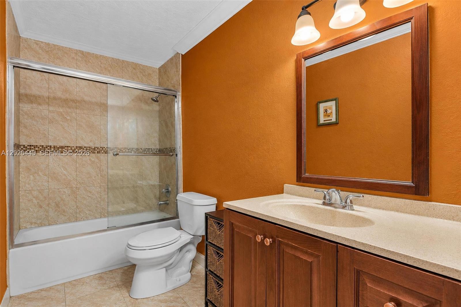 11061 Southwest 163rd Street Miami, FL 33157 - Photo 19 of 42 a bathroom with a sink and a mirror
