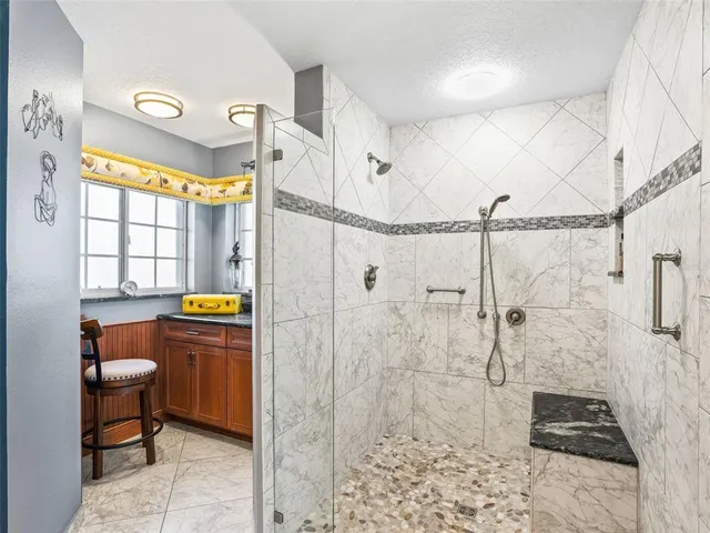 a bathroom with a sink toilet and vanity