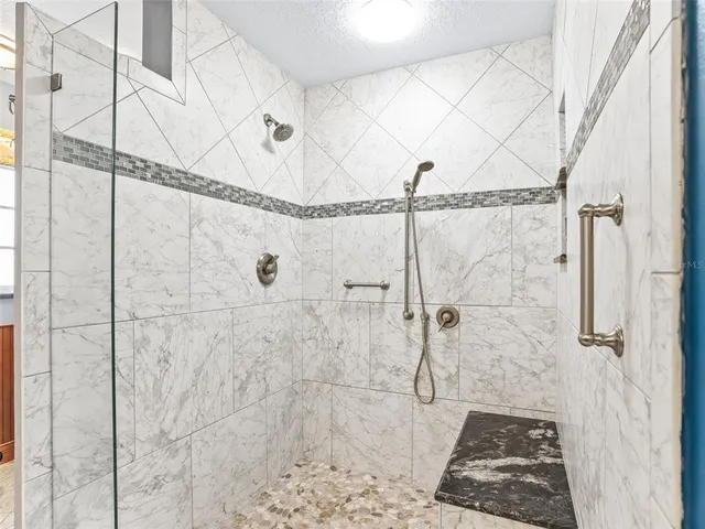 a utility room with sink dryer and washer