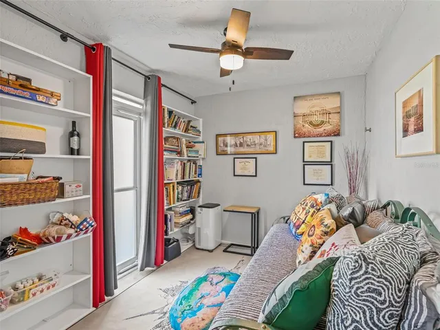 a building outdoor space with glass windows and couch