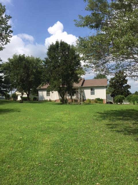 3894 Armstrong Road Springfield, TN 37172 - Photo 9 of 10 a front view of a house with garden
