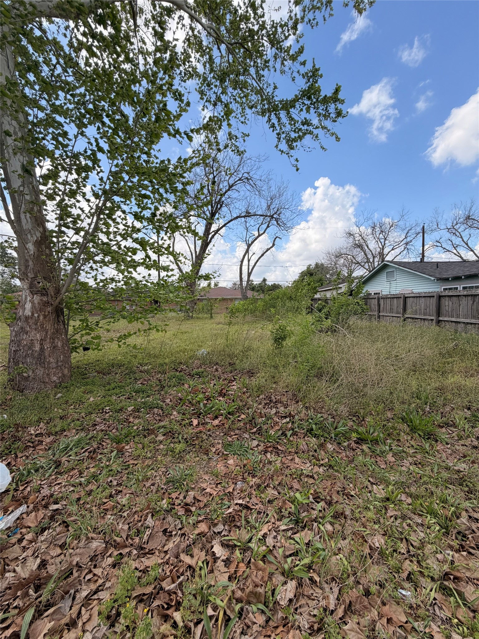 8617 Gibbons Street Houston, TX 77012 - Photo 3 of 3 a view of a lake with houses in the background