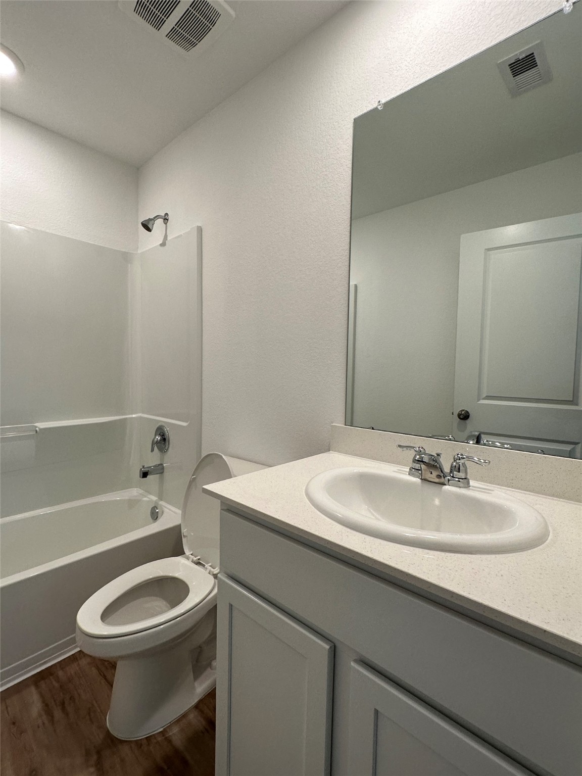 4130 Brazos Brook Trail Baytown, TX 77521 - Photo 19 of 20 a bathroom with a sink toilet and a bathtub
