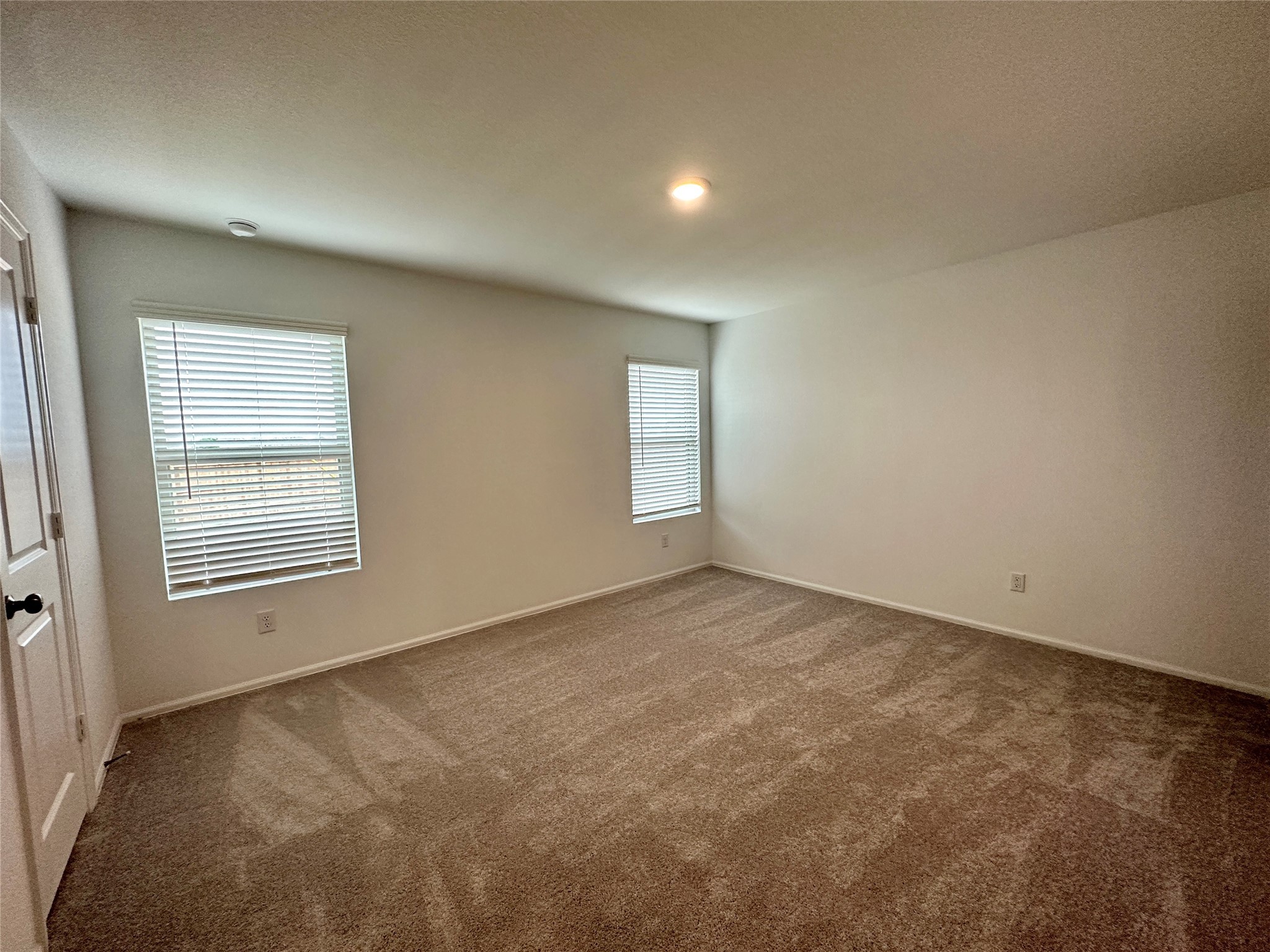 4130 Brazos Brook Trail Baytown, TX 77521 - Photo 9 of 20 an empty room with a window