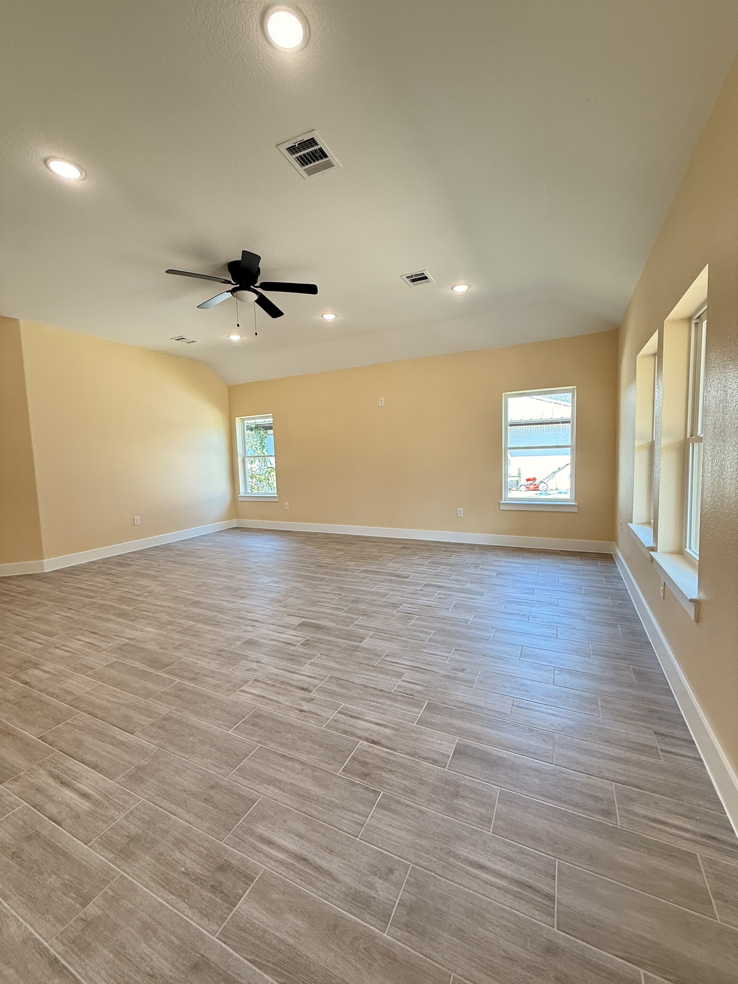 14844 Coaltown Road Willis, TX 77378 - Photo 11 of 30 wooden floor in an empty room with a window