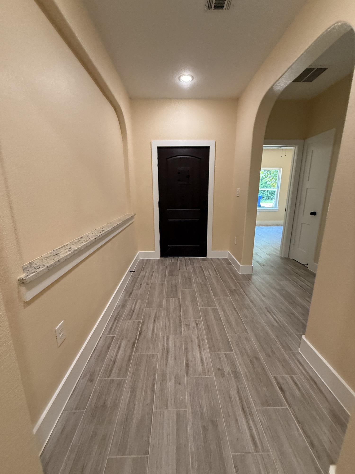 14844 Coaltown Road Willis, TX 77378 - Photo 23 of 30 a view of empty room with wooden floor