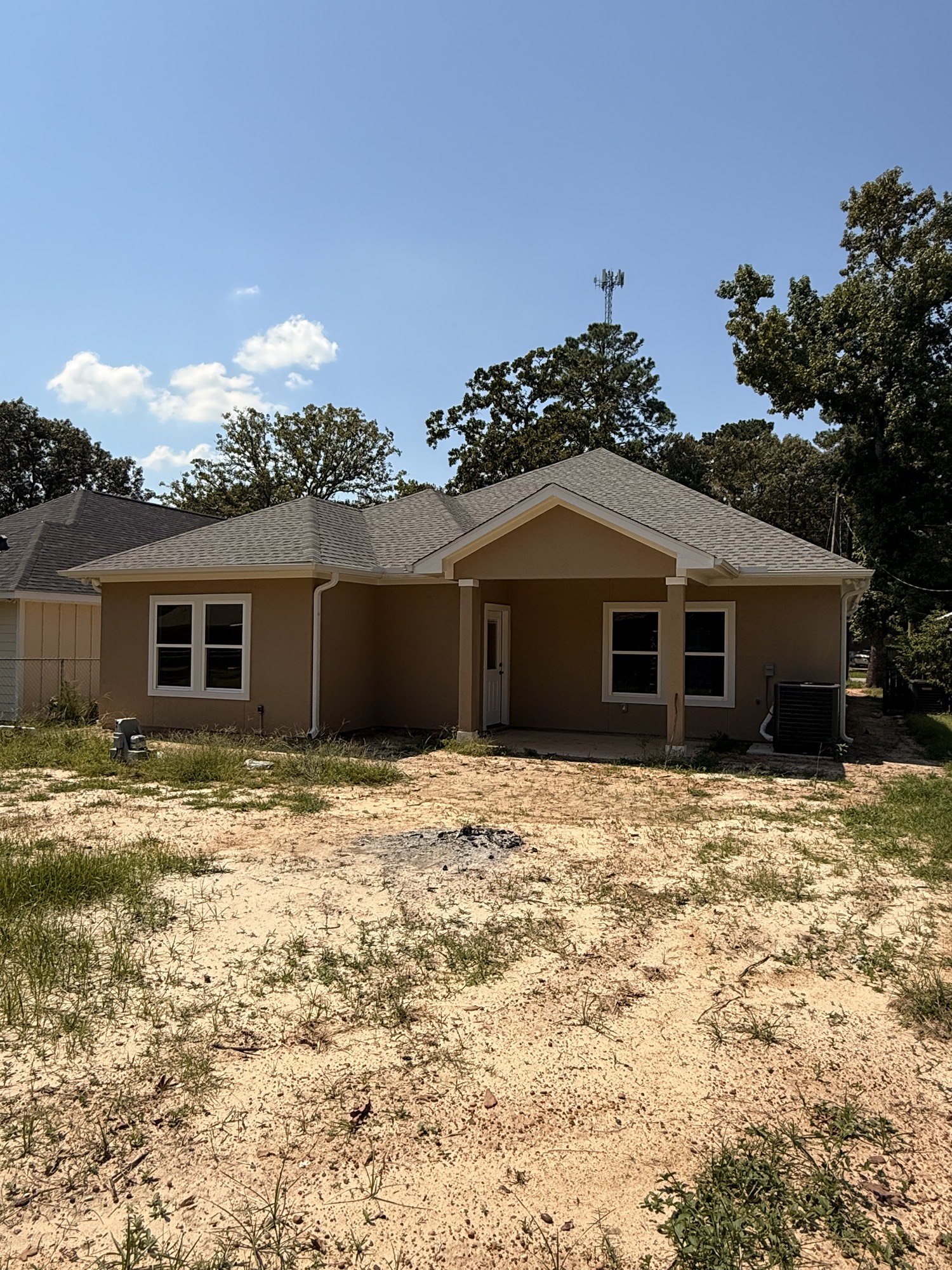 14844 Coaltown Road Willis, TX 77378 - Photo 29 of 30 a front view of a house with a garden