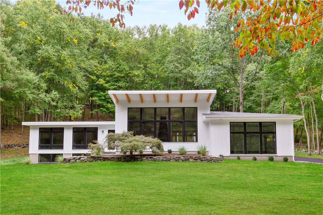 WELCOME HOME to this Pound Ridge beauty. The exterior WOW factor matches the interior's WOW.