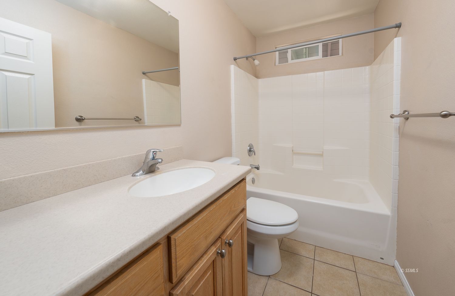 1237 West Boston Avenue Ridgecrest, CA 93555 - Photo 11 of 32 a bathroom with a sink a toilet and shower