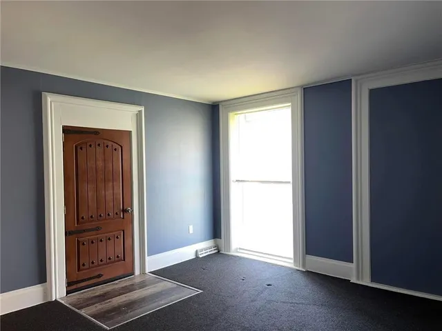 an empty room with windows