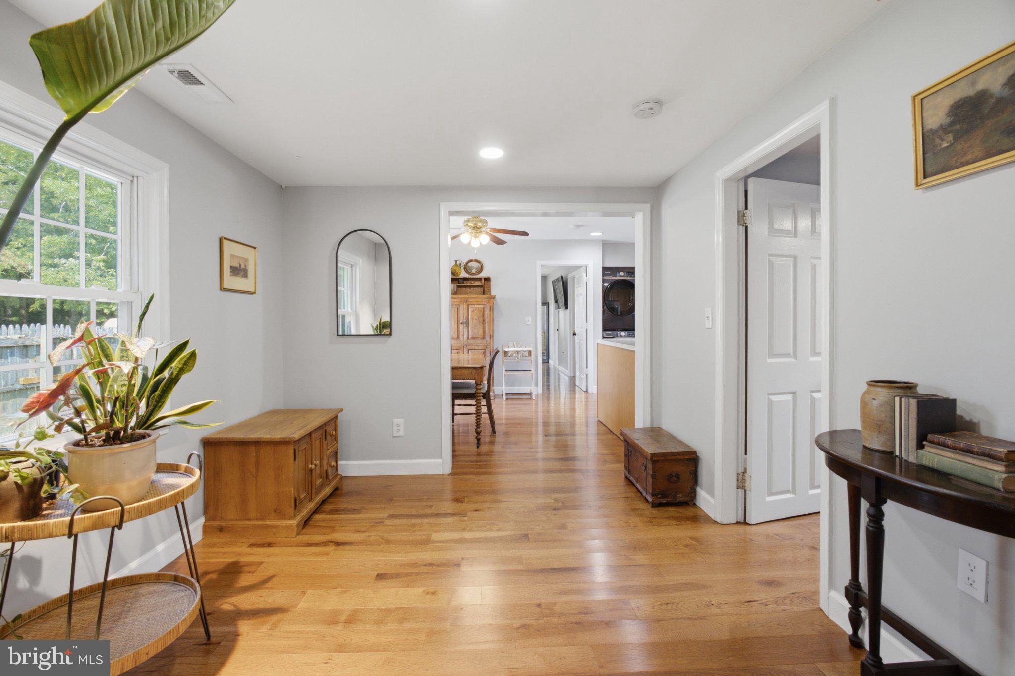 5650 Deale Churchton Road Churchton, MD 20733 - Photo 5 of 31 Inviting entryway with warm wood tones.