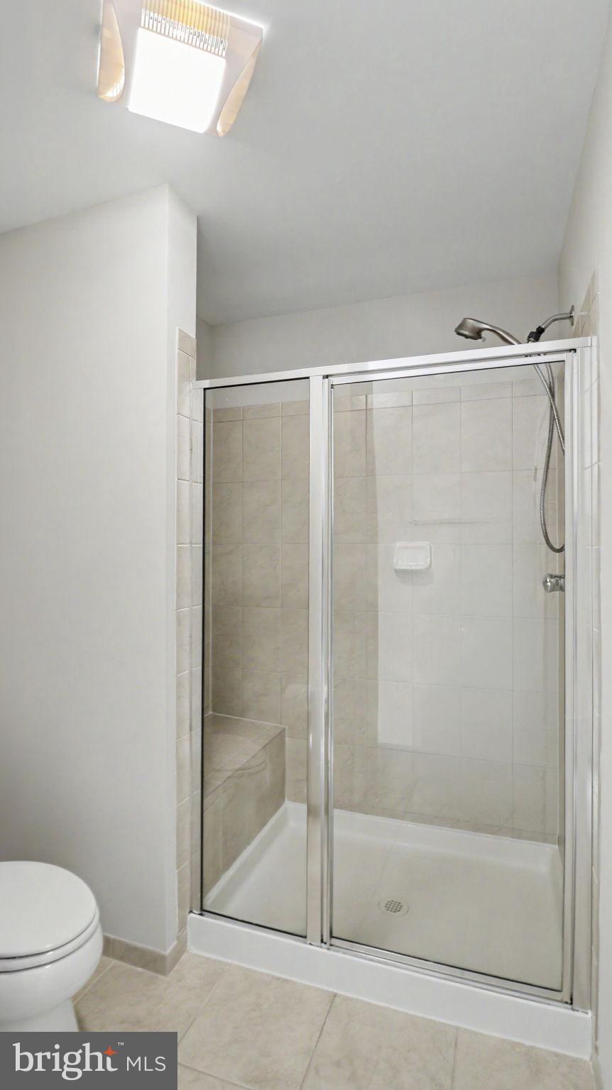 42371 Trellis Square Brambleton, VA 20148 - Photo 43 of 70 Sleek and modern shower retreat.