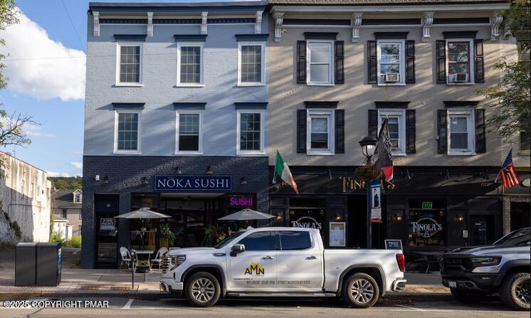 611 Main Street, Unit 201 Stroudsburg, PA 18360 - Photo 1 of 9 a car parked in front of a building