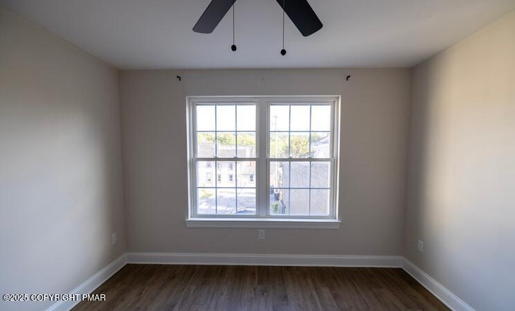 611 Main Street, Unit 201 Stroudsburg, PA 18360 - Photo 4 of 9 an empty room with a window