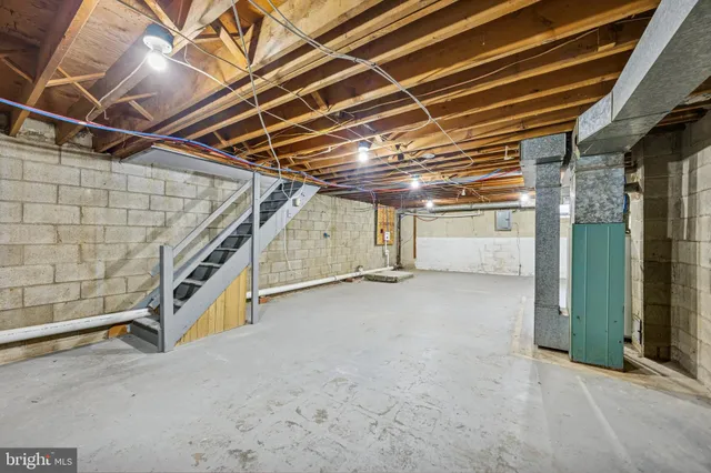 a view of an empty room with a garage