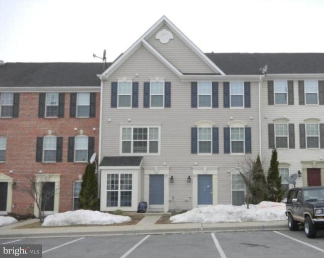 619 Tivoli Road Frederick, MD 21703 - Photo 1 of 5 a front view of a residential houses