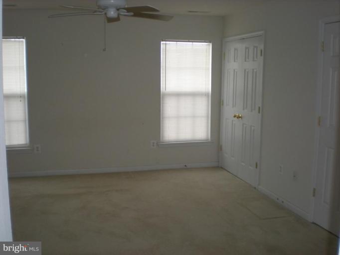 619 Tivoli Road Frederick, MD 21703 - Photo 3 of 5 an empty room with a window